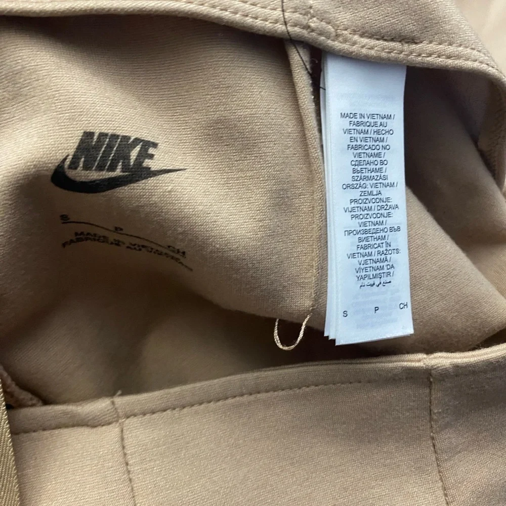 Nike embroidered-swoosh detail leggings pleated front size small